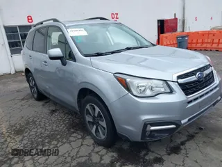 2018 Subaru Forester Premium with VIN JF2SJAGC3JH498940, listed as a IAAI auction lot 41880493 with 127,817 mi miles. Bid and sale history available at carsss.com. Image 1.
