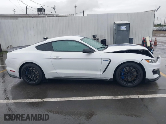 2017 Ford Mustang Shelby GT350 z VIN 1FA6P8JZ8H5521439, wystawiony jako IAAI lot #41689728 z przebiegiem 54 852 mil mil oraz . Historia ofert i sprzedaży dostępna na DreamBid. Obrazek 13.
