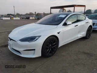 2022 Tesla Model S with VIN 5YJSA1E57NF483768, listed as a IAAI auction lot 41069339 with 35,342 mi miles and . Bid and sale history available at DreamBid. Image 19.