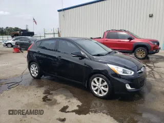 2014 Hyundai Accent SE z VIN KMHCU5AE2EU164130, wystawiony jako Copart lot #50972055 z przebiegiem 113 834 mil mil oraz Szkoda całkowita • Salvage title. Historia ofert i sprzedaży dostępna na DreamBid. Obrazek 4.
