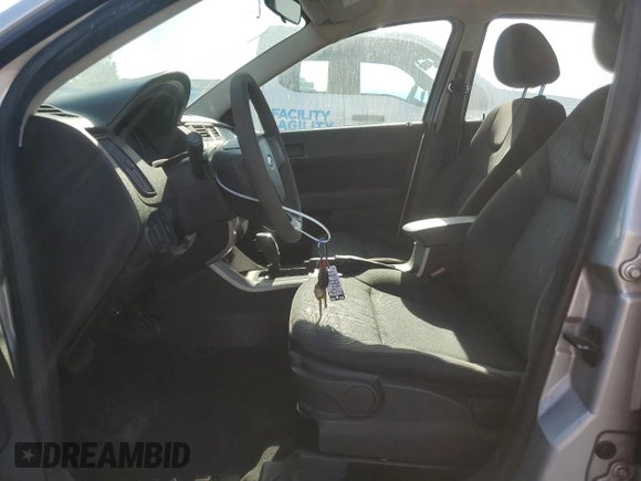 2009 Ford Focus SE with VIN 1FAHP35N69W114248, listed as a Copart auction lot 66493554 with 193,244 mi miles and Salvage Title. Bid and sale history available at carsss.com. Image 7.