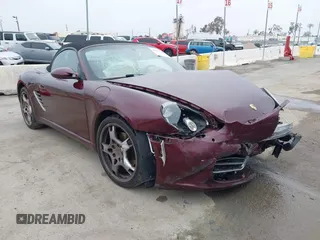2005 Porsche Boxster S z VIN WP0CB29865U731351, wystawiony jako IAAI lot #42153541 z przebiegiem 97 378 mil mil oraz . Historia ofert i sprzedaży dostępna na DreamBid. Obrazek 1.
