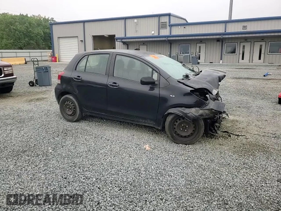 2009 Toyota Yaris with VIN JTDKT903095243922, listed as a Copart auction lot 51293545 with 196,909 mi miles and Salvage Title. Bid and sale history available at carsss.com. Image 11.
