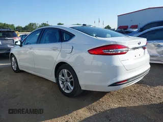 2018 Ford Fusion SE with VIN 3FA6P0H70JR250014, listed as a IAAI auction lot 41990580 with 121,628 mi miles. Bid and sale history available at carsss.com. Image 3.