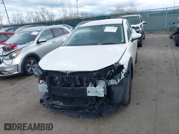 2023 Mazda CX-30 S z VIN 3MVDMBAM6PM572425, wystawiony jako IAAI lot #41833170 z przebiegiem 18 307 mil mil oraz . Historia ofert i sprzedaży dostępna na DreamBid. Obrazek 13.
