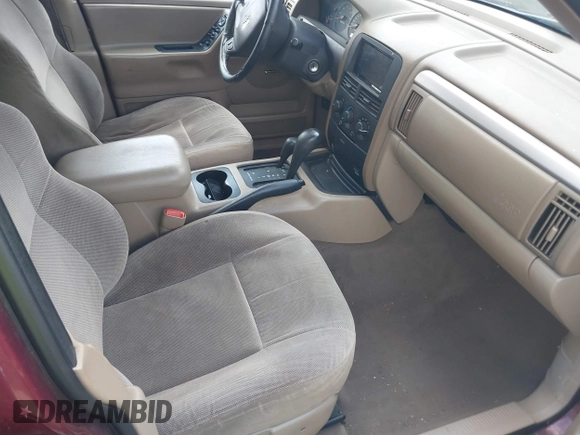 2001 Jeep Grand Cherokee Laredo with VIN 1J4GW48S91C588162, listed as a IAAI auction lot 42176476 with Not provided miles and . Bid and sale history available at DreamBid. Image 5.