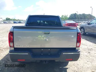 2020 Honda Ridgeline RTL with VIN 5FPYK3F5XLB025857, listed as a IAAI auction lot 42307343 with 97,262 mi miles and . Bid and sale history available at DreamBid. Image 16.