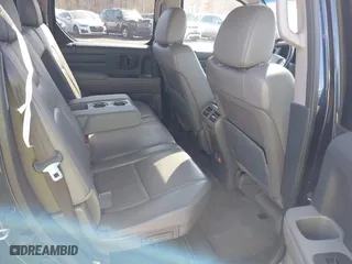 2011 Honda Ridgeline RTL with VIN 5FPYK1F51BB011686, listed as a IAAI auction lot 41790303 with 110,648 mi miles. Bid and sale history available at carsss.com. Image 8.