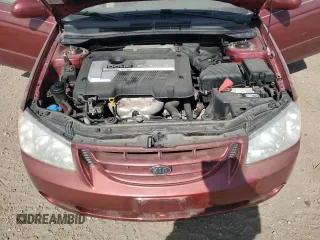 2005 Kia Spectra LX z VIN KNAFE121355162932, wystawiony jako Copart lot #56292625 z przebiegiem 92 828 mil mil oraz Szkoda całkowita • Salvage title. Historia ofert i sprzedaży dostępna na DreamBid. Obrazek 11.