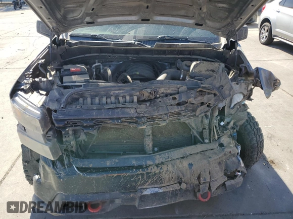 2021 Chevrolet Silverado 1500 Custom Trail Boss with VIN 1GCPYCEF5MZ430436, listed as a Copart auction lot 77466634 with 60,656 mi miles and Salvage Title. Bid and sale history available at DreamBid. Image 11.