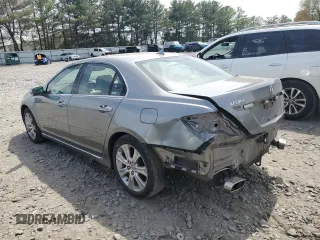 2009 Acura RL Tech Pkg with VIN JH4KB266X9C000169, listed as a Copart auction lot 54623365 with 102,035 mi miles and Salvage Title. Bid and sale history available at carsss.com. Image 2.