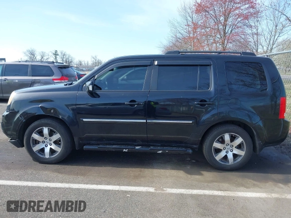 2012 Honda Pilot Touring with VIN 5FNYF4H96CB041380, listed as a IAAI auction lot 41941615 with 137,537 mi miles and . Bid and sale history available at DreamBid. Image 14.