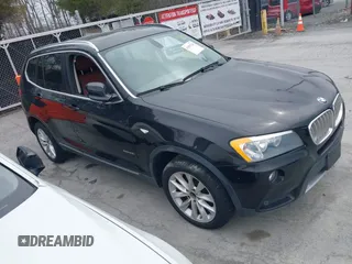 2011 BMW X3 28i with VIN 5UXWX5C59BL701386, listed as a IAAI auction lot 41897310 with 129,863 mi miles. Bid and sale history available at carsss.com. Image 1.