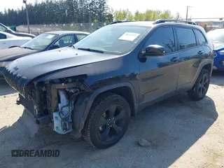 2015 Jeep Cherokee North with VIN 1C4PJMCS3FW777973, listed as a IAAI auction lot 42043203 with 158,536 mi miles. Bid and sale history available at carsss.com. Image 19.