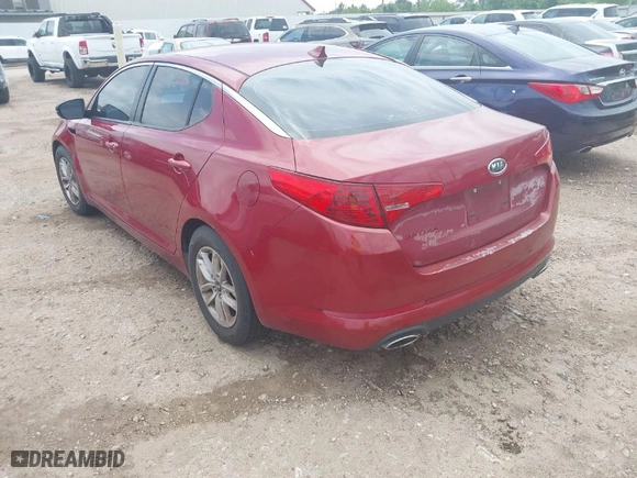 2011 Kia Optima LX with VIN KNAGM4A79B5057807, listed as a IAAI auction lot 42086984 with 133,261 mi miles. Bid and sale history available at carsss.com. Image 3.