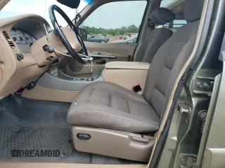 2001 Ford Explorer Sport Trac with VIN 1FMZU67E61UC73126, listed as a Copart auction lot 58207385 with 163,915 mi miles and Salvage title. Bid and sale history available at DreamBid. Image 7.