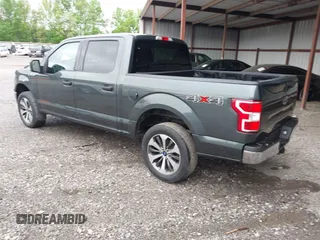 2018 Ford F-150 XL with VIN 1FTEW1EG4JKE17790, listed as a IAAI auction lot 42128519 with 153,740 mi miles. Bid and sale history available at carsss.com. Image 3.