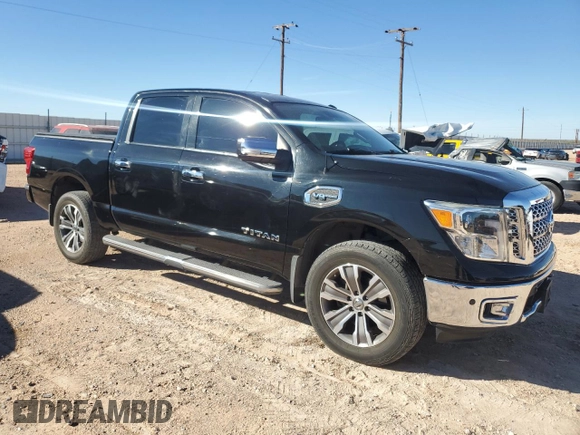 2017 Nissan Titan SL z VIN 1N6AA1E54HN554049, wystawiony jako Copart lot #81404094 z przebiegiem 97 811 mil mil oraz Czysty tytuł • Clean title. Historia ofert i sprzedaży dostępna na DreamBid. Obrazek 4.