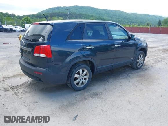 2013 Kia Sorento LX with VIN 5XYKTCA60DG403769, listed as a IAAI auction lot 42265980 with 215,013 mi miles and . Bid and sale history available at DreamBid. Image 4.
