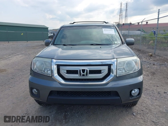 2011 Honda Pilot Touring with VIN 5FNYF4H90BB103824, listed as a IAAI auction lot 42127137 with 243,858 mi miles and . Bid and sale history available at carsss.com. Image 12.