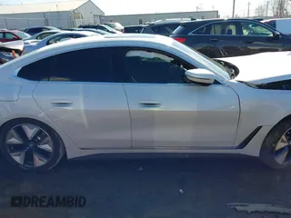 2024 BMW i4 xDrive40 with VIN WBY83FB0XRFS41891, listed as a IAAI auction lot 41630295 with 7,287 mi miles. Bid and sale history available at carsss.com. Image 14.