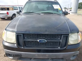 2005 Ford Explorer Sport Trac XLS z VIN 1FMZU67K15UA13387, wystawiony jako IAAI lot #42158317 z przebiegiem 170 703 mil mil oraz . Historia ofert i sprzedaży dostępna na DreamBid. Obrazek 6.