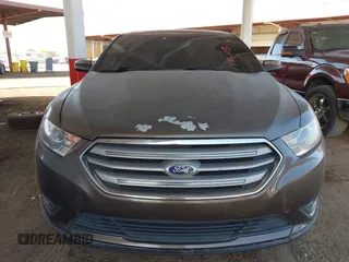 2015 Ford Taurus SEL with VIN 1FAHP2H87FG176103, listed as a IAAI auction lot 41950844 with 205,014 mi miles. Bid and sale history available at carsss.com. Image 6.