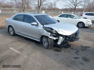 2016 Volkswagen Passat 1.8T SEL with VIN 1VWCT7A3XGC018484, listed as a IAAI auction lot 41763388 with 123,484 mi miles. Bid and sale history available at carsss.com. Image 1.