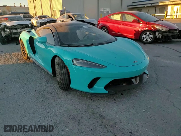 2023 McLaren GT z VIN SBM22GCA0PW002765, wystawiony jako Copart lot #78866364 z przebiegiem Nie podano mil oraz Szkody całkowita. Historia ofert i sprzedaży dostępna na DreamBid. Obrazek 11.