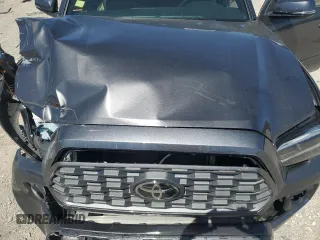 2023 Toyota Tacoma SR with VIN 3TYCZ5AN9PT131515, listed as a Copart auction lot 57900865 with Not provided miles and Salvage title. Bid and sale history available at DreamBid. Image 11.