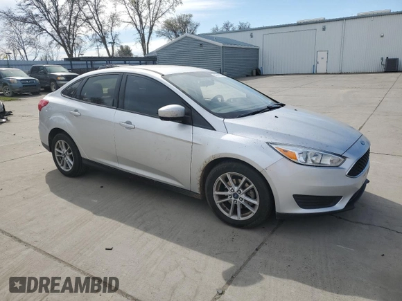 2018 Ford Focus SE with VIN 1FADP3FE3JL261145, listed as a Copart auction lot 47411315 with 98,581 mi miles and Salvage Title. Bid and sale history available at carsss.com. Image 4.