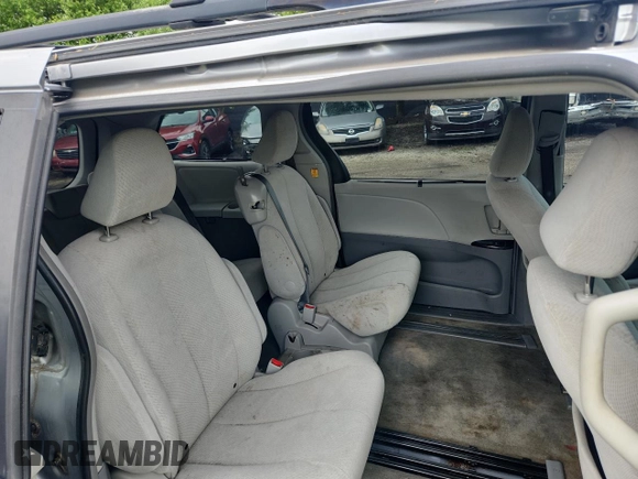 2012 Toyota Sienna LE AAS with VIN 5TDKK3DC4CS244048, listed as a Copart auction lot 55940585 with 163,222 mi miles and Clean Title. Bid and sale history available at DreamBid. Image 6.