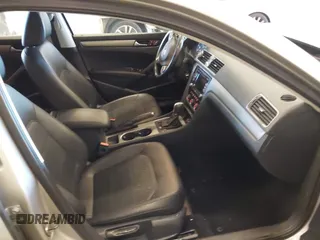 2014 Volkswagen Passat SE z VIN 1VWBN7A36EC064753, wystawiony jako IAAI lot #41221736 z przebiegiem 106 105 mil mil oraz . Historia ofert i sprzedaży dostępna na DreamBid. Obrazek 5.
