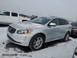2016 Volvo XC60 T5 Premier with VIN YV4612RK5G2825535, listed as a Copart auction lot 84975144 with 74,677 mi miles and Salvage Title. Bid and sale history available at carsss.com. Image 1.