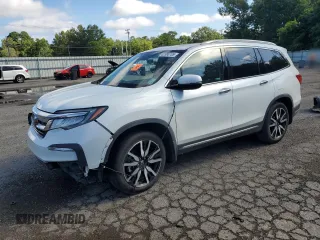 2021 Honda Pilot Touring 8-Passenger with VIN 5FNYF5H94MB042955, listed as a Copart auction lot 62386735 with 58,976 mi miles and Salvage title. Bid and sale history available at DreamBid. Image 1.