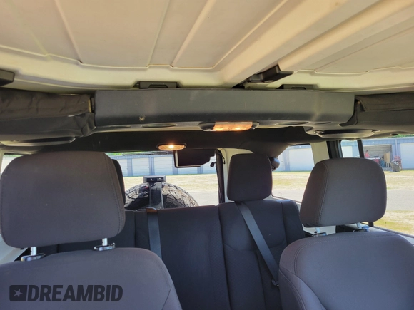 2014 Jeep Wrangler Unlimited Sport with VIN 1C4HJWDG4EL159619, listed as a IAAI auction lot 42176313 with 79,715 mi miles and . Bid and sale history available at DreamBid. Image 8.