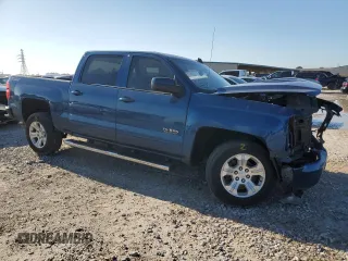 2017 Chevrolet Silverado 1500 LT with VIN 3GCUKREC3HG455371, listed as a Copart auction lot 52123755 with 123,770 mi miles and Salvage Title. Bid and sale history available at DreamBid. Image 4.