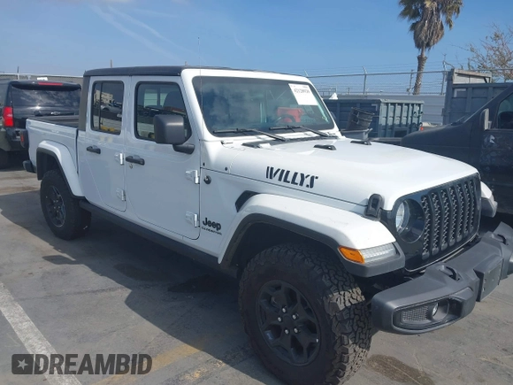 2022 Jeep Gladiator Texas Trail with VIN 1C6HJTAG1NL148524, listed as a IAAI auction lot 42128920 with 42,004 mi miles. Bid and sale history available at carsss.com. Image 1.