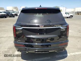 2023 Cadillac XT6 AWD Sport z VIN 1GYKPGRS2PZ130847, wystawiony jako Copart lot #58174474 z przebiegiem 11 958 mil mil oraz Tytuł czysty. Historia ofert i sprzedaży dostępna na DreamBid. Obrazek 6.