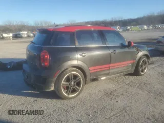 2015 MINI Countryman John Cooper Works with VIN WMWXD1C5XFWS34732, listed as a Copart auction lot 42402185 with Not Provided miles and Salvage Title. Bid and sale history available at DreamBid. Image 3.