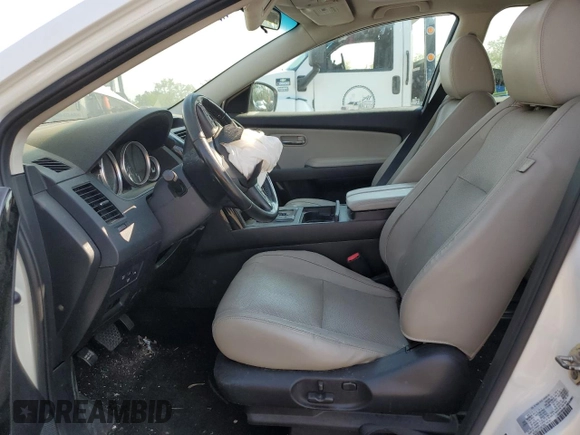 2015 Mazda CX-9 Touring z VIN JM3TB2CA7F0467259, wystawiony jako Copart lot #55646055 z przebiegiem Nie podano mil oraz Czysty tytuł • Clean title. Historia ofert i sprzedaży dostępna na DreamBid. Obrazek 7.