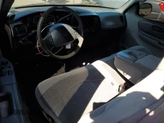 1999 Ford F-150 XL с VIN 2FTRX08L4XCA00426, выставлен на аукционе Copart как лот 68354464 с пробегом 157 539 миль миль и Списание • Salvage title. История ставок и продаж доступна на DreamBid. Изображение 8.