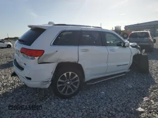 2017 Jeep Grand Cherokee Overland с VIN 1C4RJFCG2HC769223, выставлен на аукционе Copart как лот 60676775 с пробегом 83 962 миль миль и Списание • Salvage title. История ставок и продаж доступна на DreamBid. Изображение 3.
