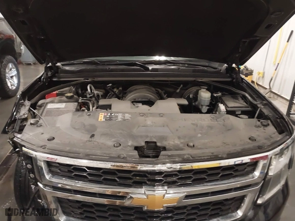 2020 Chevrolet Tahoe LT with VIN 1GNSKBKC2LR123473, listed as a IAAI auction lot 41782983 with 86,980 mi miles. Bid and sale history available at carsss.com. Image 10.