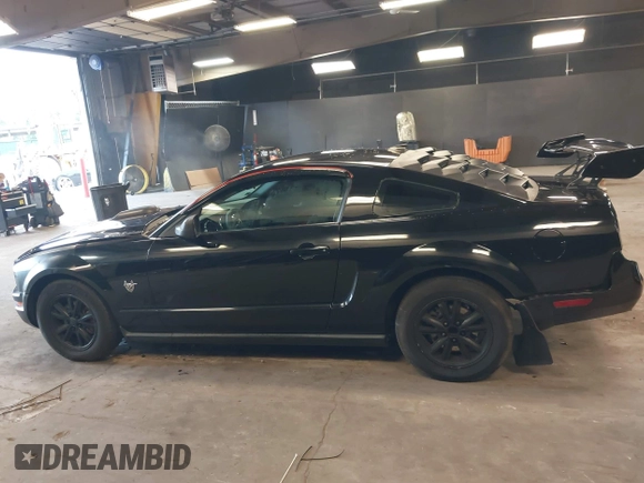 2009 Ford Mustang with VIN 1ZVHT80N695142483, listed as a IAAI auction lot 42672035 with 201,019 mi miles and . Bid and sale history available at DreamBid. Image 14.