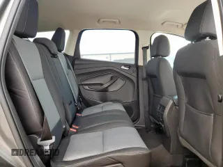 2017 Ford Escape SE z VIN 1FMCU9G91HUE17654, wystawiony jako Copart lot #56173175 z przebiegiem 97 678 mil mil oraz Czysty tytuł • Clean title. Historia ofert i sprzedaży dostępna na DreamBid. Obrazek 11.