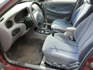1999 Hyundai Elantra z VIN KMHJW35F0XU129498, wystawiony jako Copart lot #74481134 z przebiegiem 72 123 mil mil oraz Czysty tytuł • Clean title. Historia ofert i sprzedaży dostępna na DreamBid. Obrazek 7.