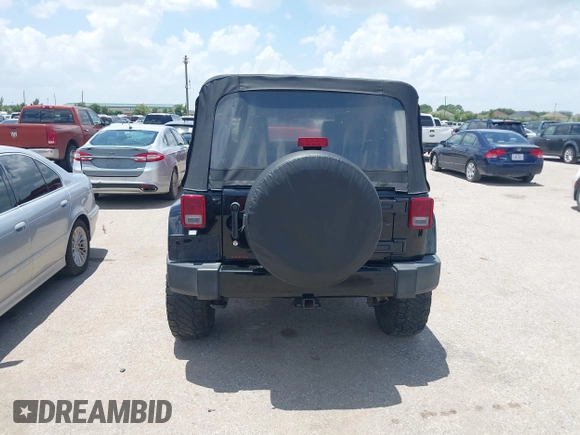 2015 Jeep Wrangler Unlimited Sahara with VIN 1C4HJWEG6FL572674, listed as a IAAI auction lot 42736266 with 97,024 mi miles and . Bid and sale history available at DreamBid. Image 16.