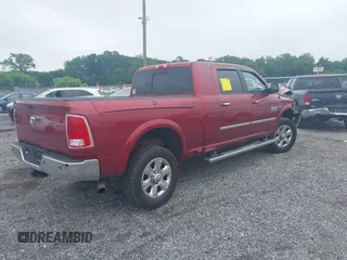 2014 Ram 2500 Laramie with VIN 3C6UR5NJ1EG276591, listed as a IAAI auction lot 42517879 with 145,466 mi miles and . Bid and sale history available at DreamBid. Image 4.