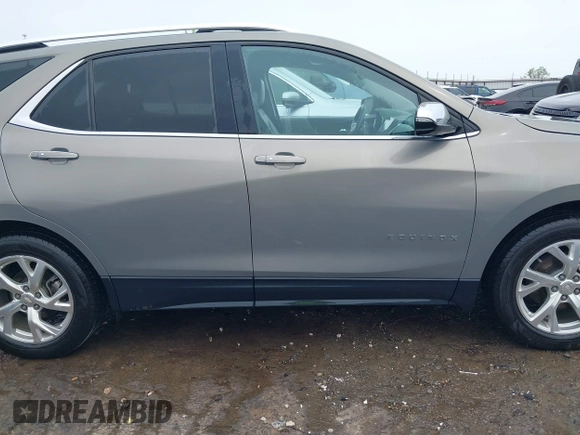 2019 Chevrolet Equinox Premier z VIN 3GNAXNEVXKS503474, wystawiony jako IAAI lot #42084263 z przebiegiem 93 838 mil mil oraz . Historia ofert i sprzedaży dostępna na DreamBid. Obrazek 14.